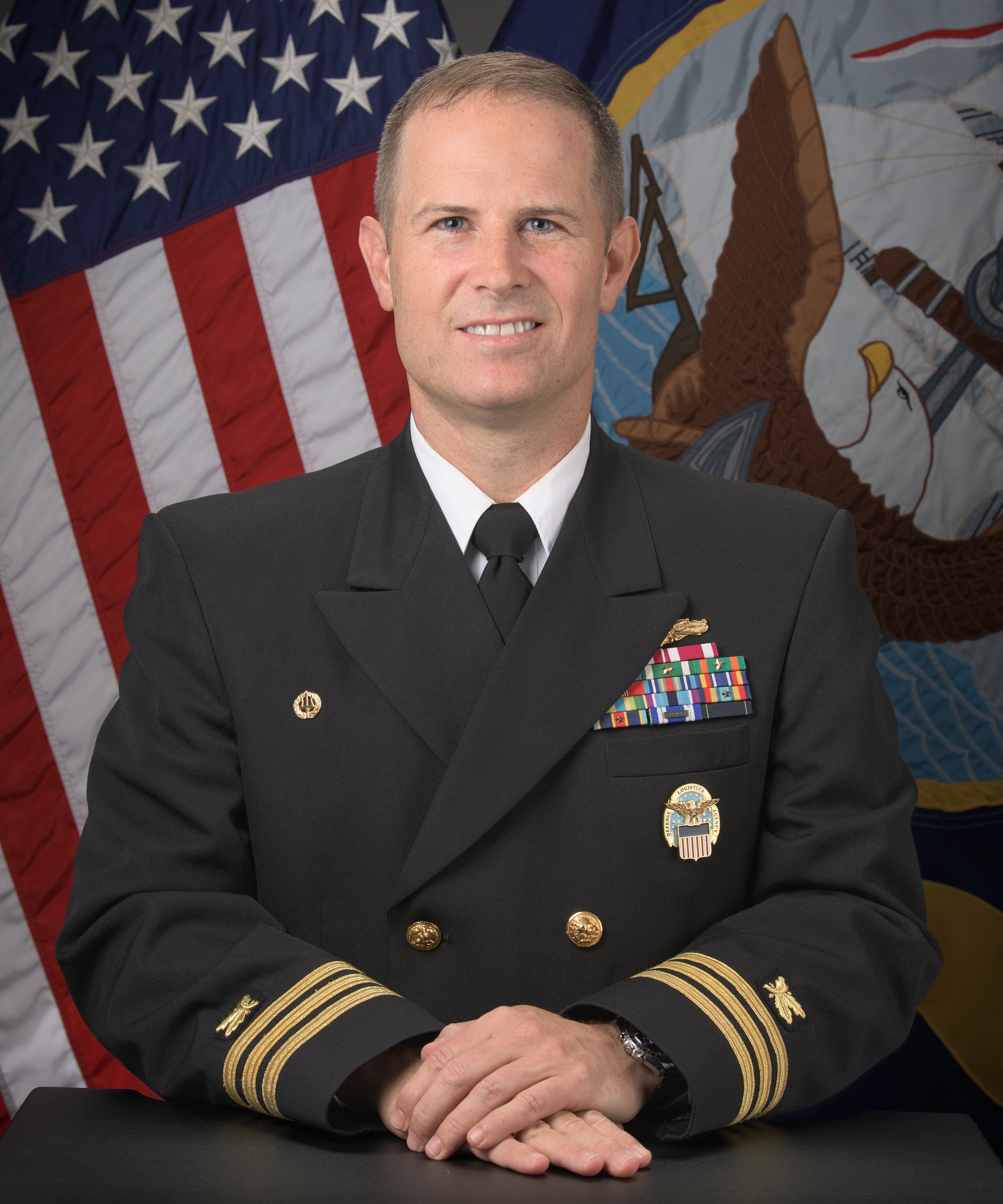 Cmdr. James R. Marsh, SC, USN, Commander